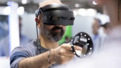 Image: a man wearing virtual reality equipment; Copyright: Messe Düsseldorf